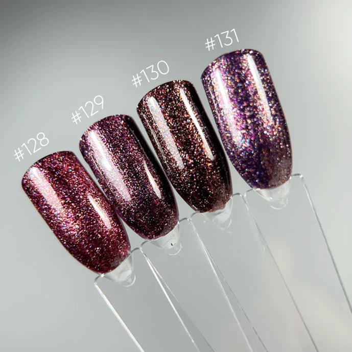 Set of glittery nail polish samples on clear stands with color codes.