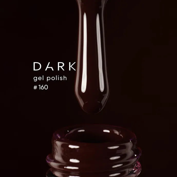 Dark gel polish bottle with a droplet on a black background