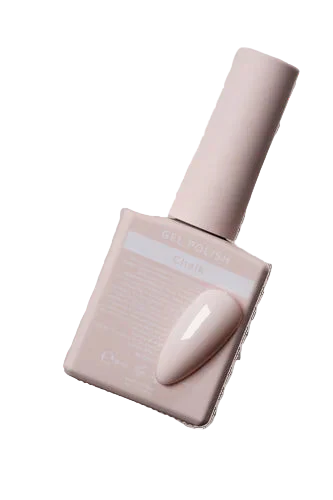 Pink nail polish with matching brush on a white background
