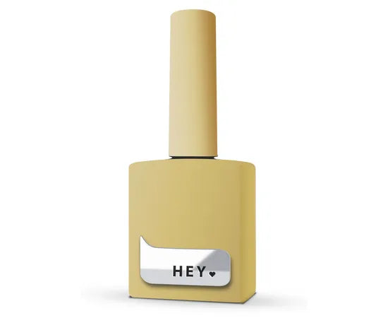 Yellow nail polish bottle with 'HEY' label on a white background