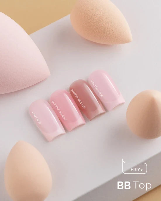 Set of pink top coats with text on a light background, HEYLOVE brand.