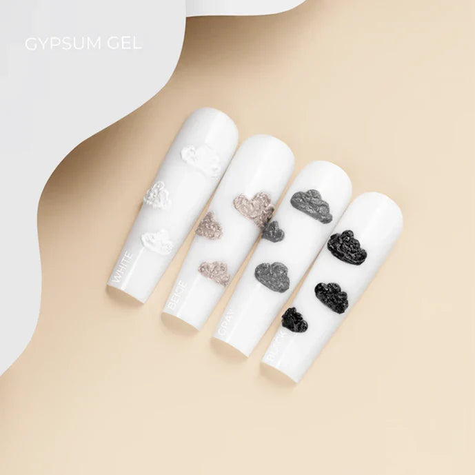 White nail tips with decorative hearts on a beige background, labeled 'Gypsum Gel'. Brand HEYLOVE
