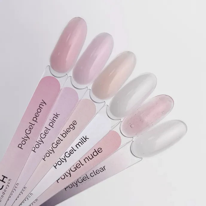 Set of PolyGel nail samples with different colors on a white background