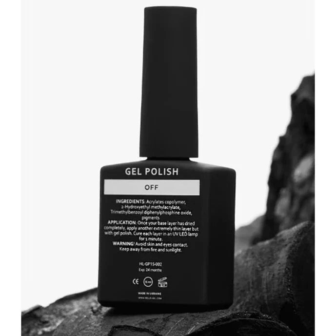 Black gel polish bottle with label on a textured surface. HEYLOVE